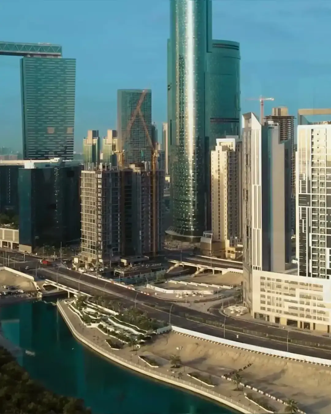 Al Reem Island apartment towers above the canal at dusk, Abu Dhabi