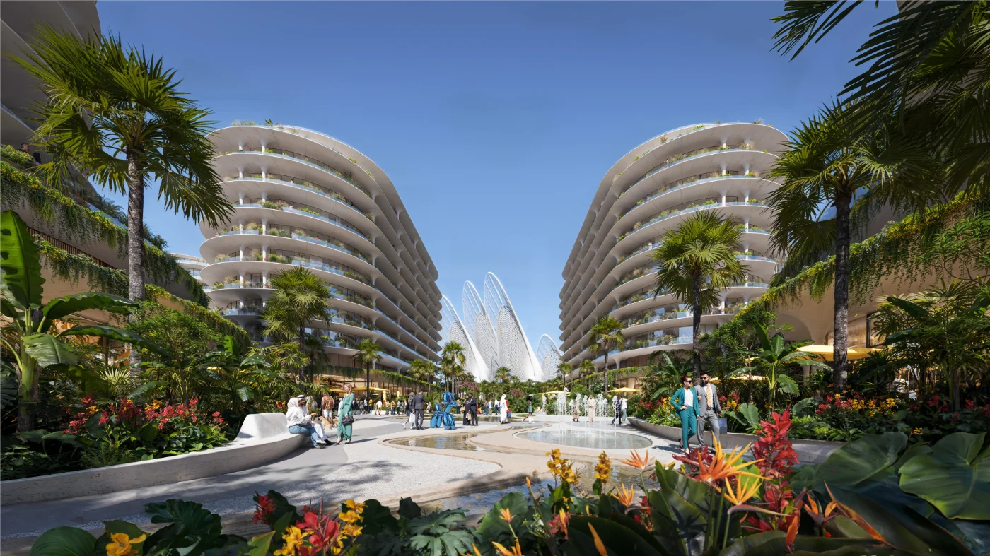 Street-level plaza between the curved BIG-designed buildings at The Row Saadiyat