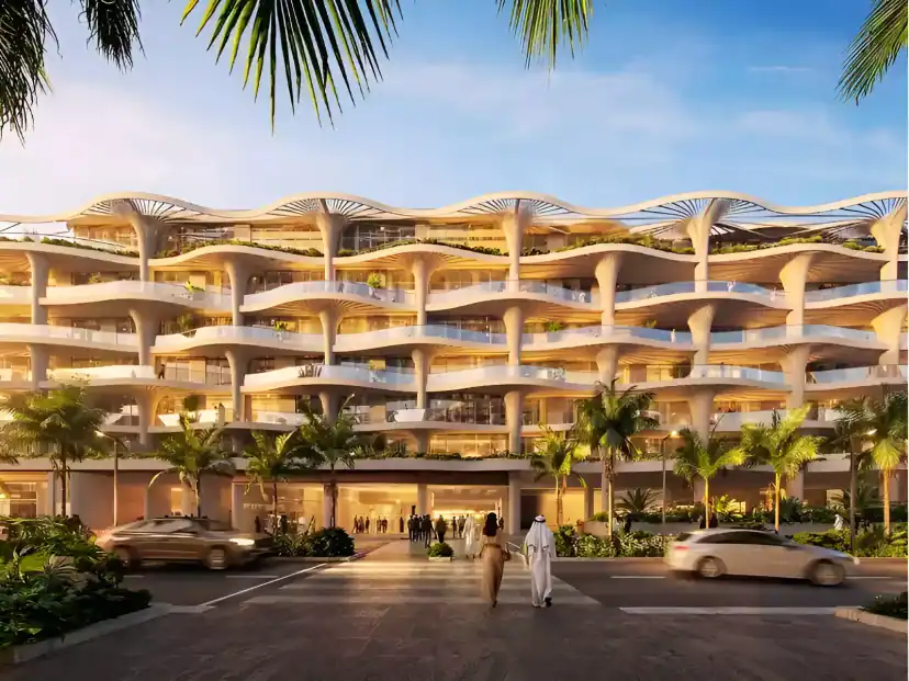 Rendering of a wide white building with wavy balconies and planted terraces, with people crossing a street and two cars passing in front, framed by palm leaves.