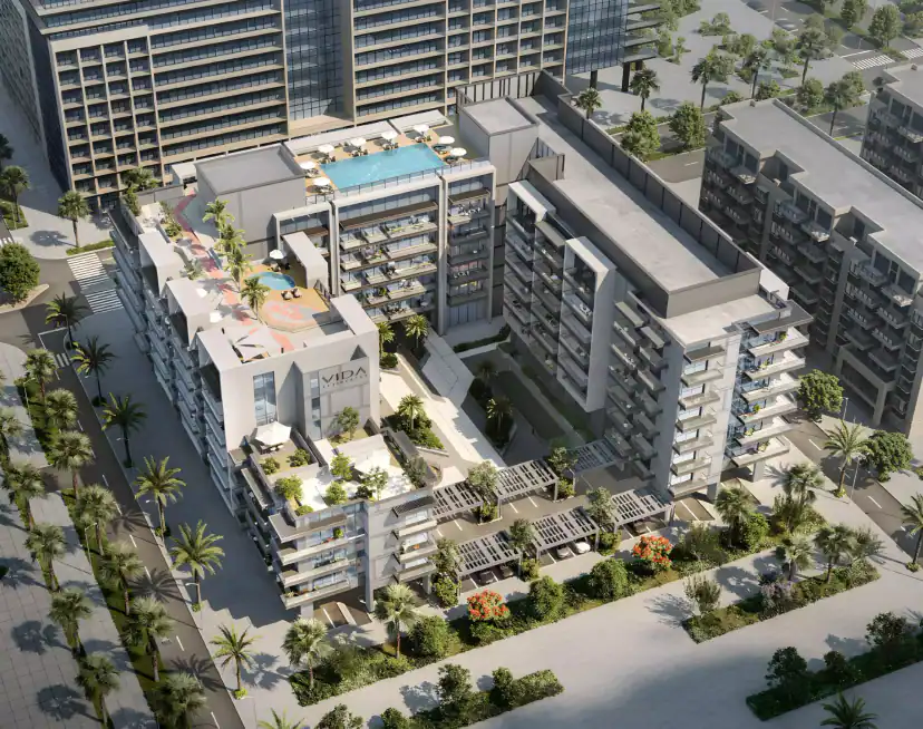 Aerial rendering of apartment buildings with rooftop swimming pools, terraces with greenery, covered parking with pergolas, and palm-lined streets around the block.