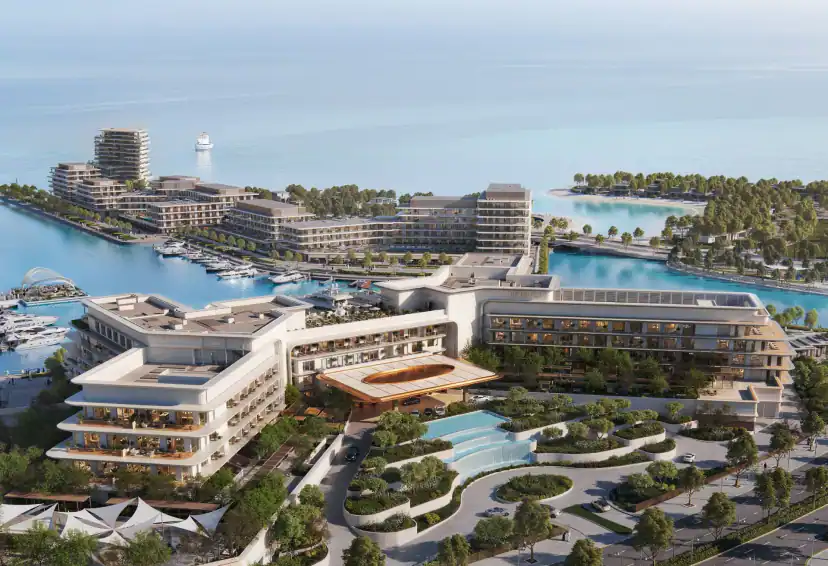 Aerial rendering of a terraced waterfront hotel-style building with a rooftop and a curved entrance canopy, beside a marina, a small pool and landscaped paths.