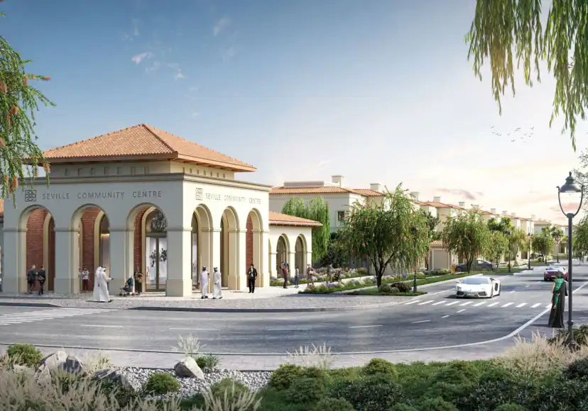 Rendering of an arched community building with a terracotta roof beside a street, with pedestrians, a white sports car and rows of houses behind.