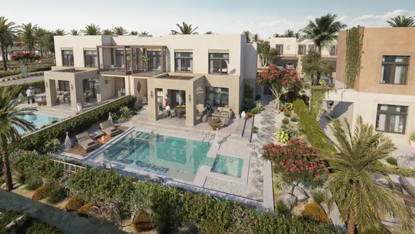 Aerial rendering of a beige house with covered patios facing a rectangular pool with a small adjoining pool, lounge chairs, a stepping stone path, palms and flowering shrubs.