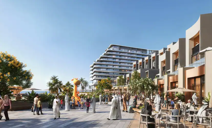 Rendering of a pedestrian plaza with people in traditional and casual clothing, a tall giraffe figure, outdoor café seating, townhouse-style units and a stepped multistory building behind.