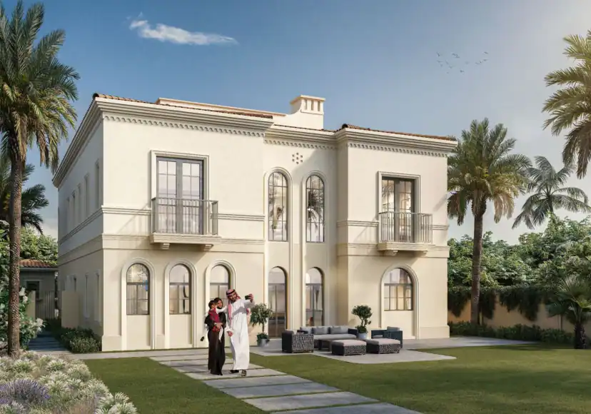 Rendering of a two-story cream villa with arched windows and two balconies, a garden lounge area, a stone path, palm trees and two people standing.