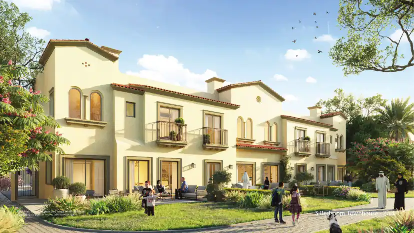 Rendering of the rear of a townhouse row with arched windows and balconies, a garden lawn, seated residents, children walking and two adults in traditional dress.